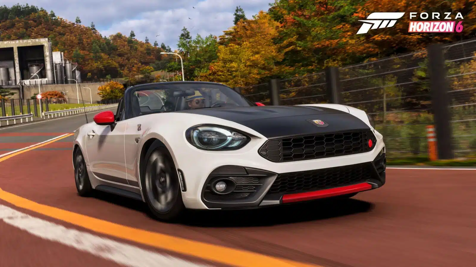 Abarth 124 Spider blanche sur une route japonaise en automne dans Forza Horizon 6