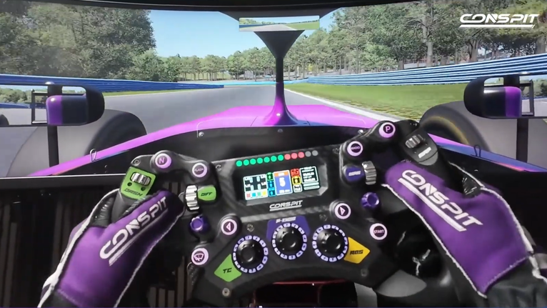 Volant Conspit à écran vu depuis le cockpit d'une monoplace, sur un circuit d'iRacing