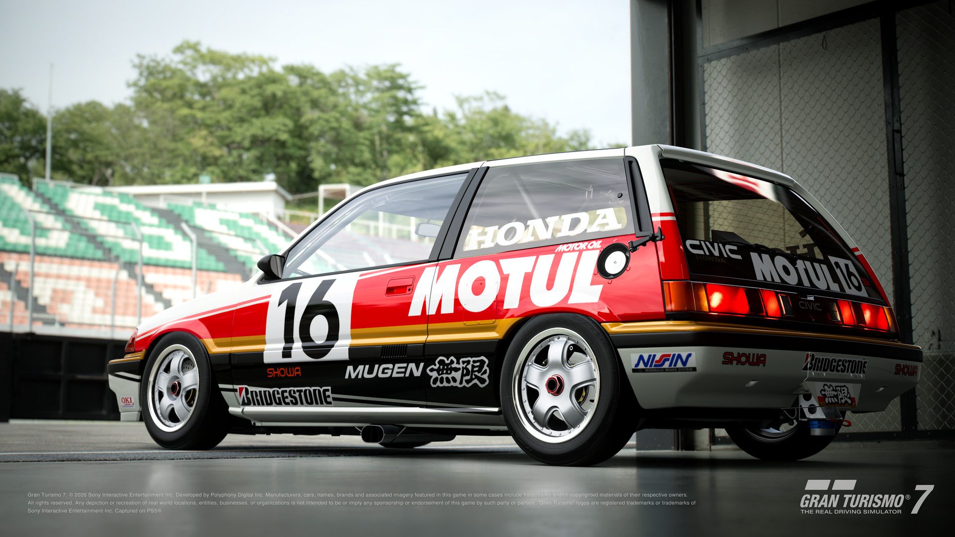 La Honda Civic Si Group A version '87 aux couleurs Motul devant les stands