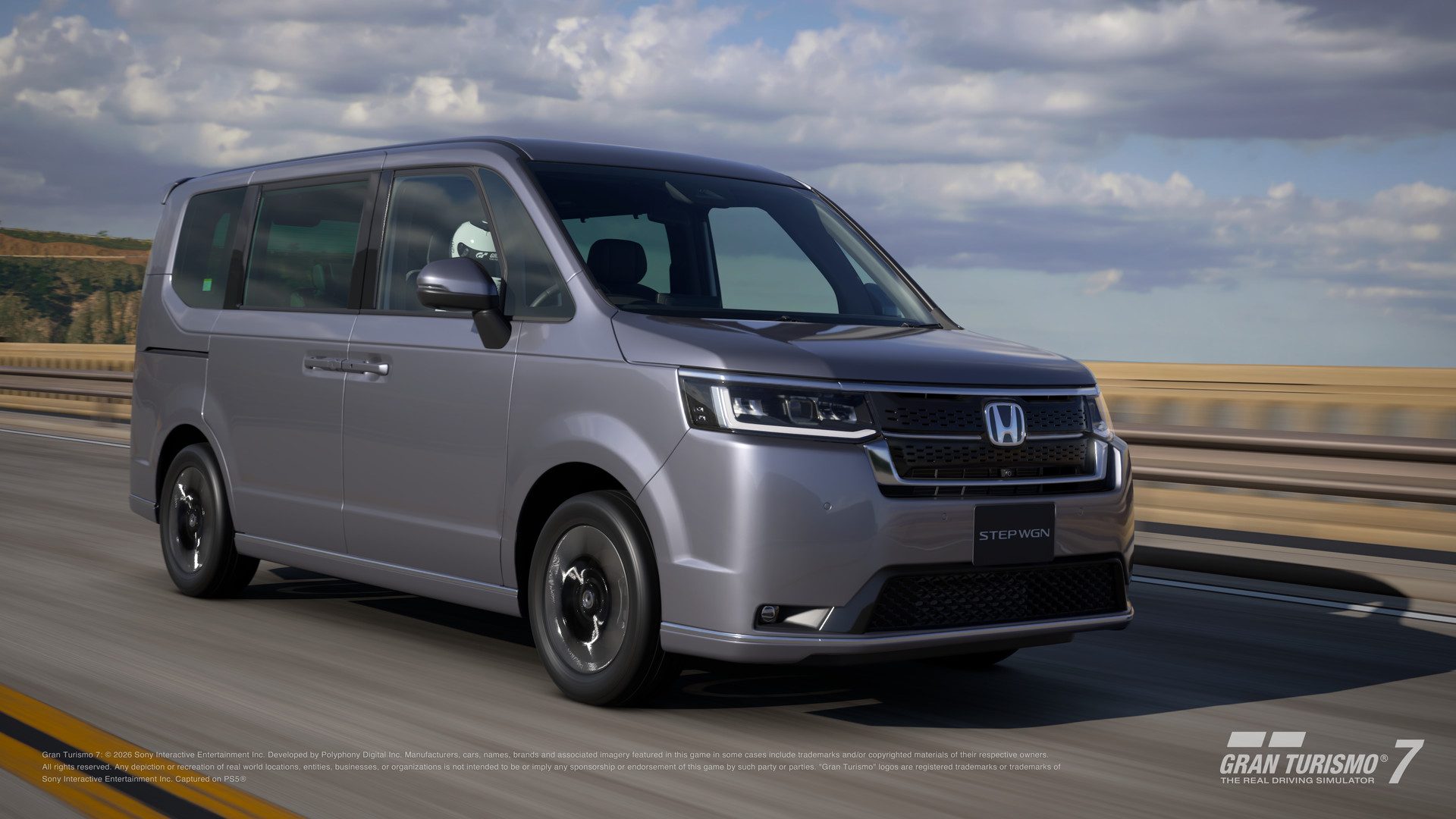 Le Honda Step WGN Spada Premium Line '23 gris sur une route
